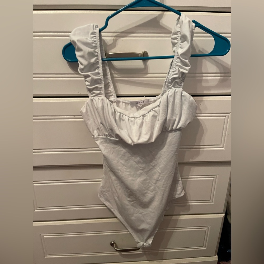 white ruffle bodysuit